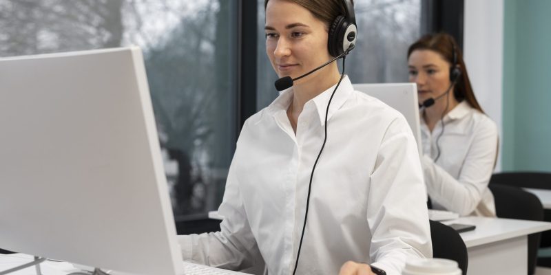 woman-working-call-center-office-with-headphones-computer